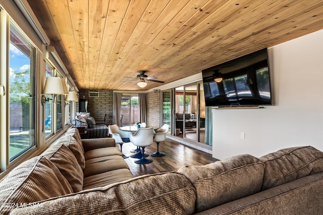 living room featuring ceiling fan, wood ceiling, and hardwood / wood-style flooring