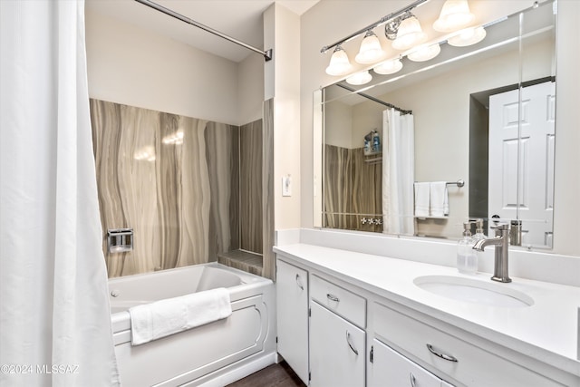 bathroom with shower / bathtub combination with curtain and vanity