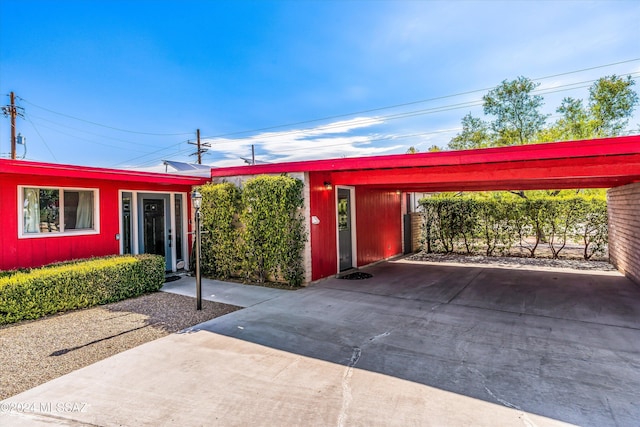 view of front of property with a carport