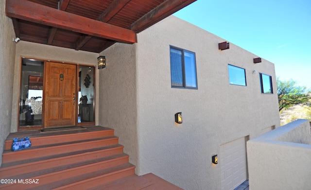 entrance to property with a garage