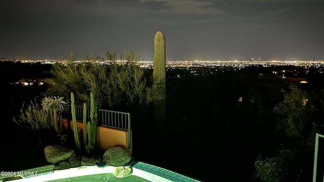 view of yard at twilight