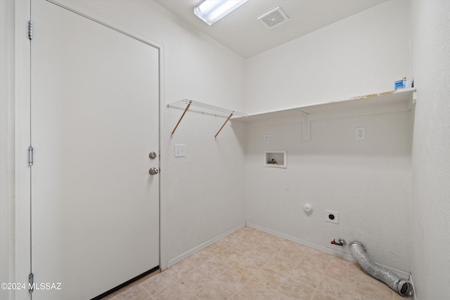 washroom featuring gas dryer hookup, washer hookup, and hookup for an electric dryer