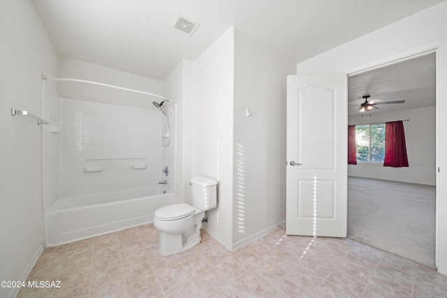 bathroom featuring shower / bathing tub combination, ceiling fan, toilet, and tile patterned floors