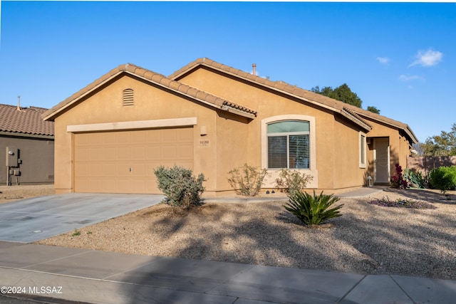 view of front of home with a garage