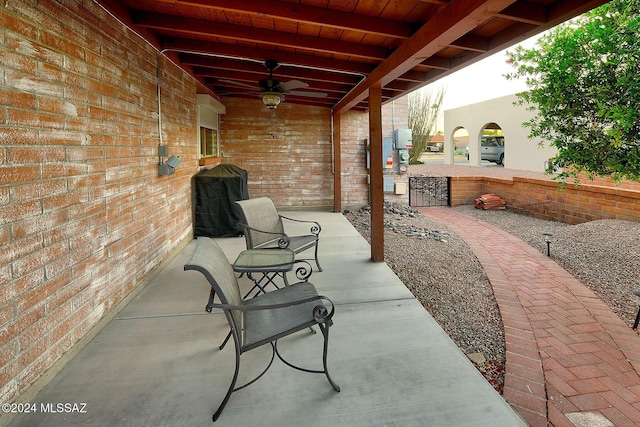 view of patio / terrace with grilling area and ceiling fan