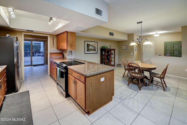 kitchen featuring pendant lighting, black electric range oven, stone counters, stainless steel fridge, and light tile patterned floors