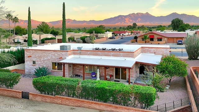 view of front facade featuring a mountain view