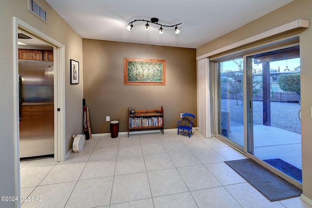 interior space featuring light tile patterned floors