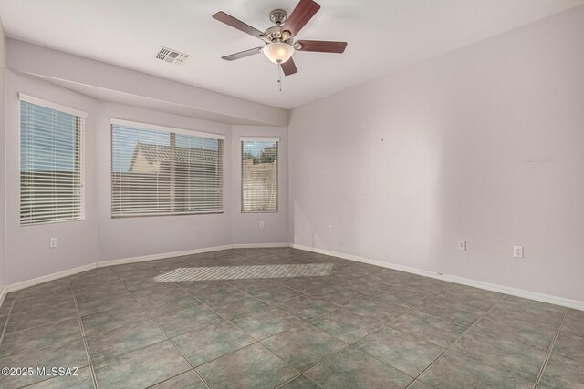 kitchen featuring light tile patterned flooring and appliances with stainless steel finishes