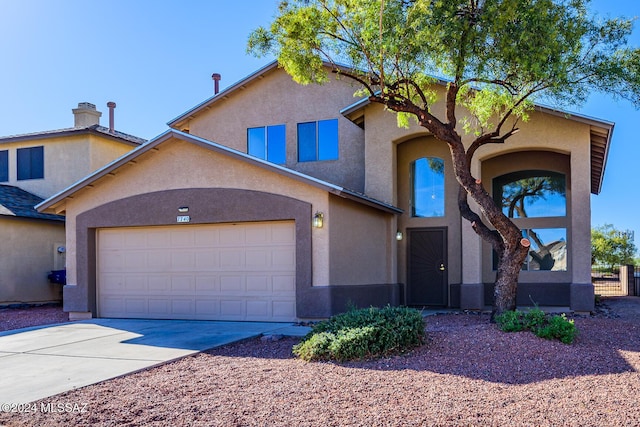 view of front of property featuring a garage