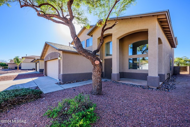 view of front of home featuring a garage