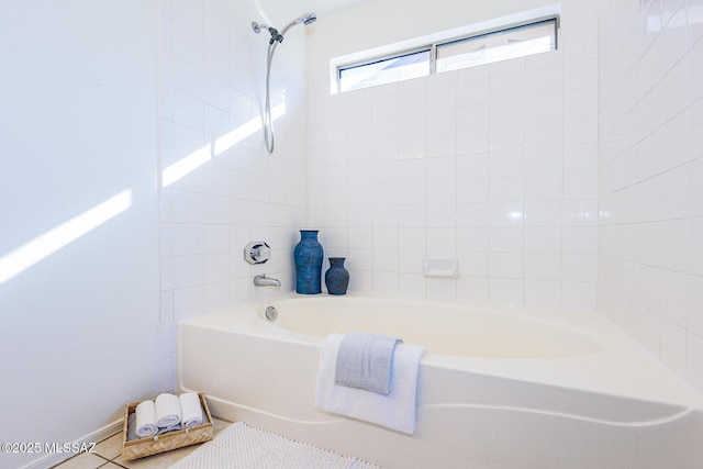 bathroom with tile patterned floors and bathing tub / shower combination