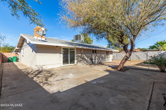 back of property featuring a patio