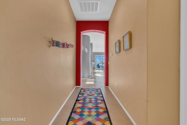 hallway with light tile patterned flooring