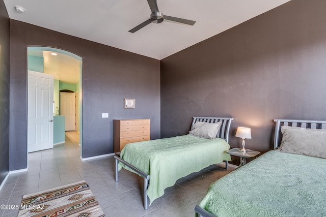 bedroom featuring tile patterned flooring and ceiling fan