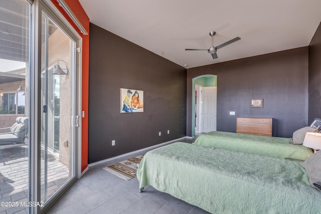 bedroom featuring access to exterior, tile patterned floors, and ceiling fan