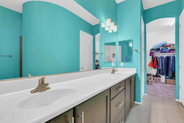 bathroom with vanity and tile patterned floors