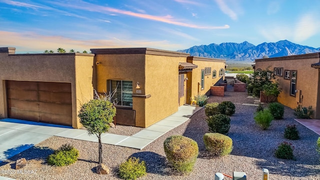 view of front of house with a mountain view