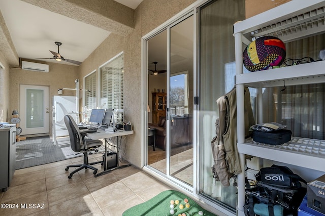 tiled office with a wall unit AC and ceiling fan