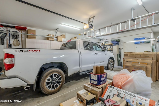 garage featuring a garage door opener