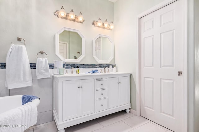 bathroom featuring tile patterned floors and vanity