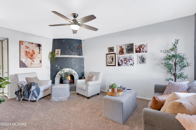 living room with carpet and ceiling fan