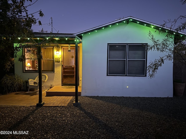 view of front of home with a patio area