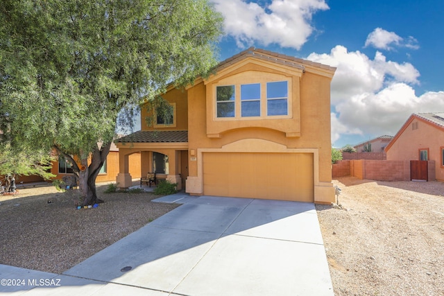 view of front of property featuring a garage