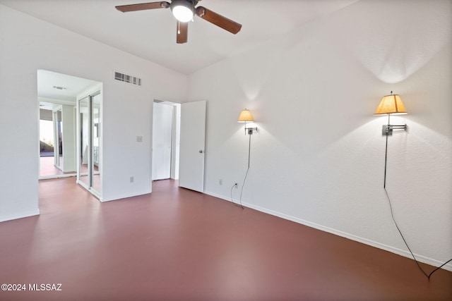 empty room featuring ceiling fan