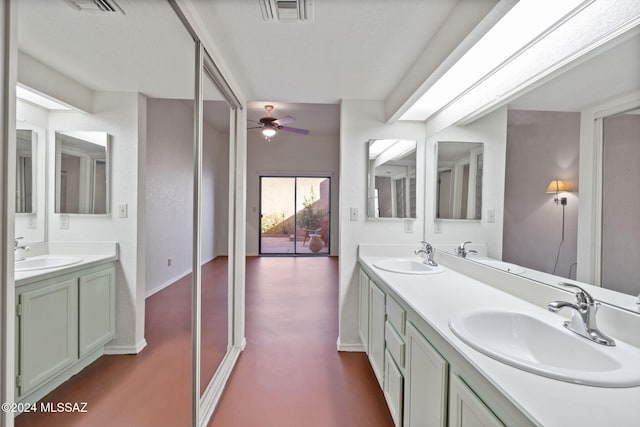 bathroom with vanity and ceiling fan