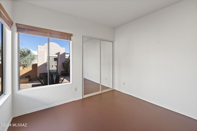 unfurnished bedroom featuring a closet