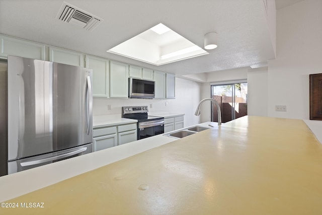 kitchen featuring sink and appliances with stainless steel finishes