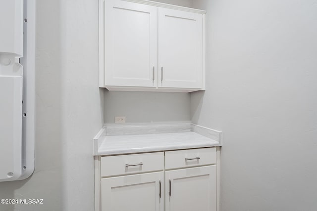 interior space with white cabinetry