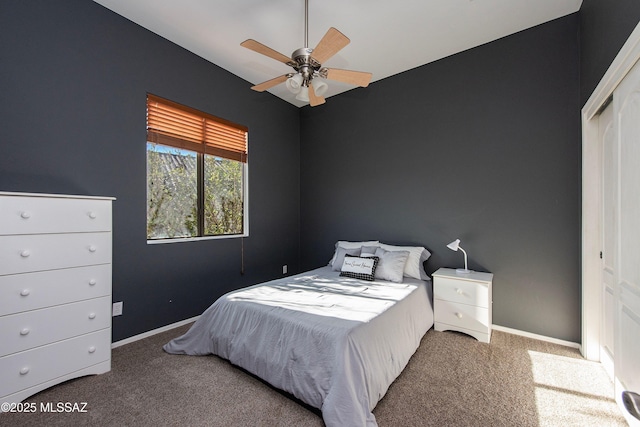 bedroom featuring ceiling fan, carpet floors, and a closet