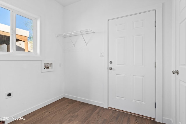 washroom featuring hookup for a washing machine, dark hardwood / wood-style flooring, and electric dryer hookup
