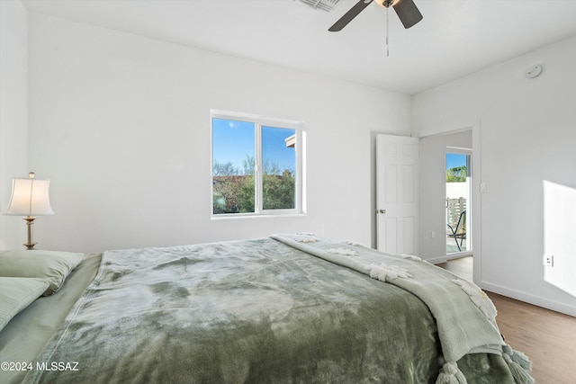 bedroom featuring ceiling fan and hardwood / wood-style floors