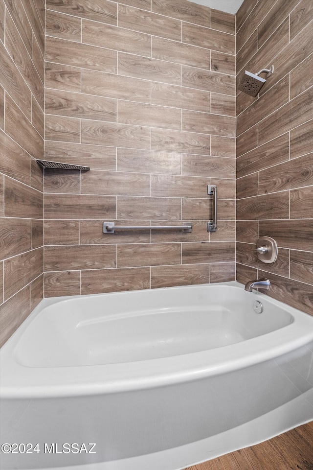 bathroom featuring a tub