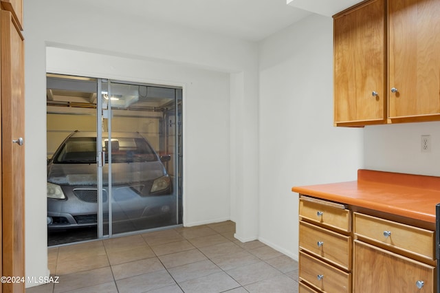 interior space with light tile patterned floors