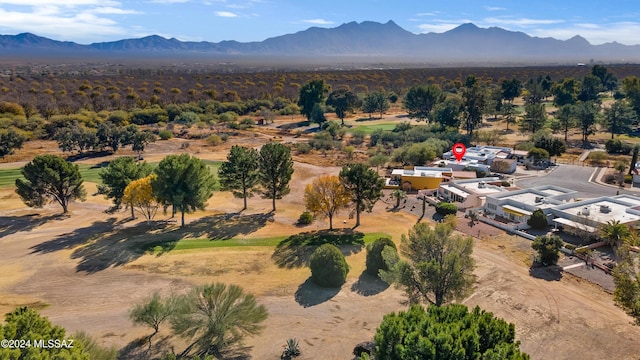 birds eye view of property with a mountain view