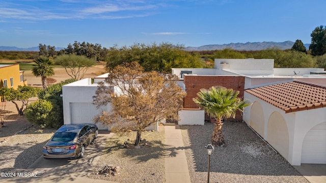 view of front of house with a mountain view