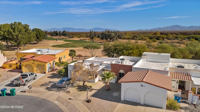 drone / aerial view featuring a mountain view