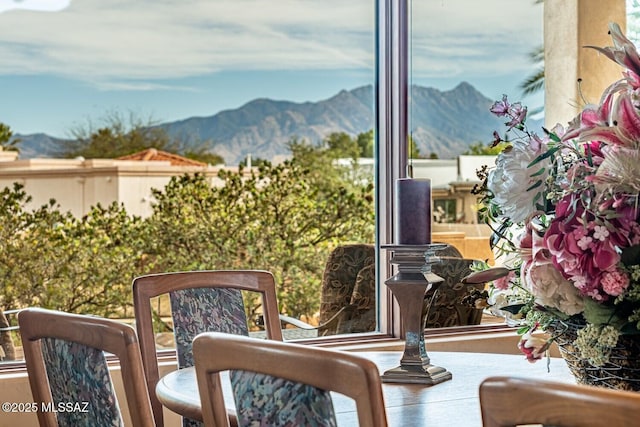 balcony featuring a mountain view