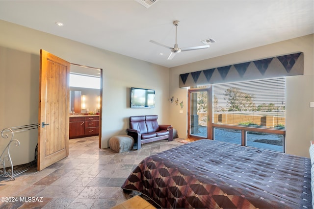 bedroom featuring ceiling fan, ensuite bath, and access to exterior