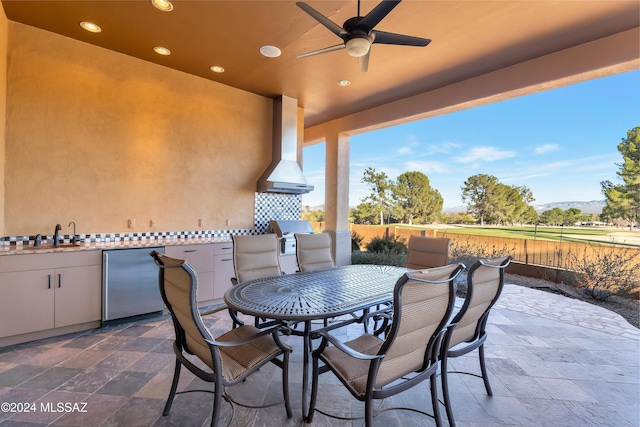 view of patio featuring grilling area, exterior kitchen, ceiling fan, and sink