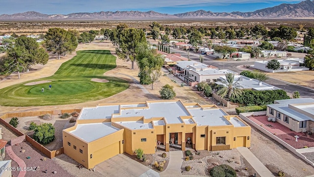 birds eye view of property featuring a mountain view