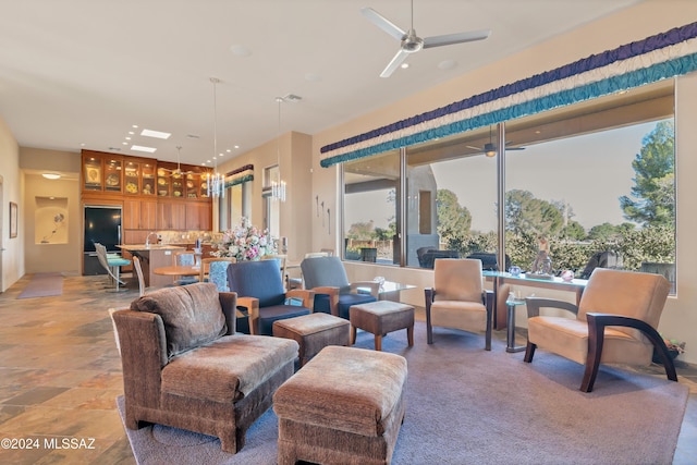 living room featuring ceiling fan