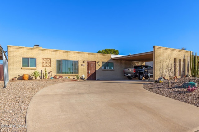 view of front facade featuring a carport