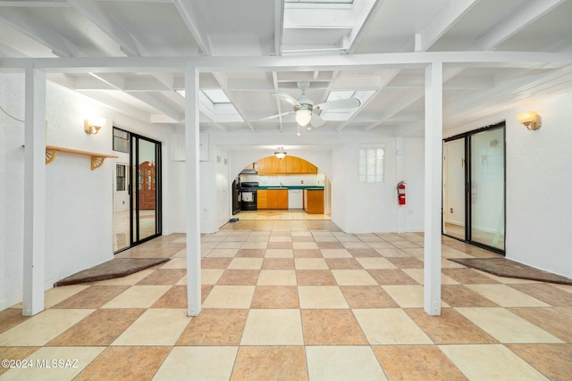 basement featuring ceiling fan