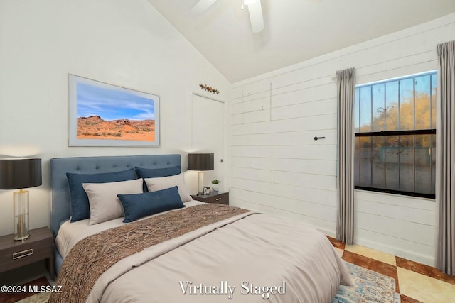 bedroom with lofted ceiling and ceiling fan