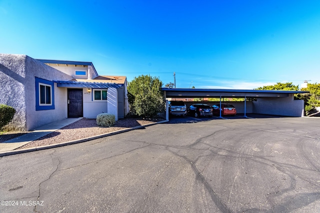 view of front of house featuring a carport